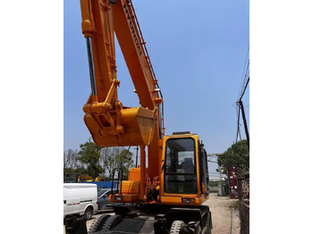 Pelle sur pneus DOOSAN DH210W-7