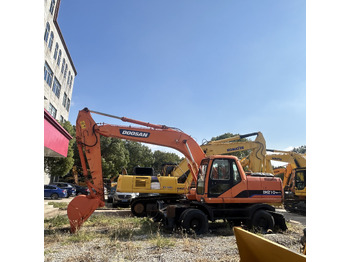 Pelle sur pneus DOOSAN DH210W-7