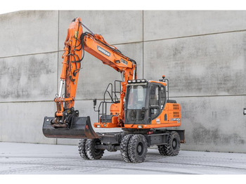 Pelle sur pneus DOOSAN DX140W-3