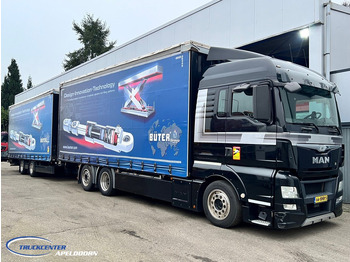 Camion à rideaux coulissants MAN TGX 26.440